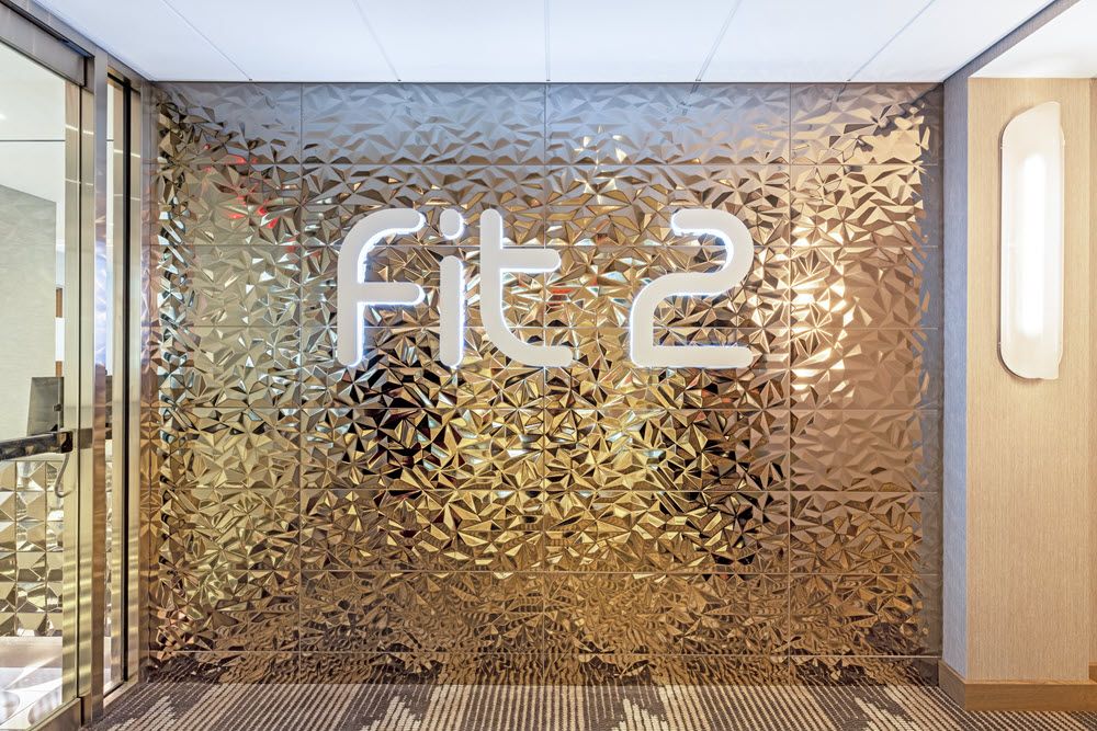 Textured glass wall with words "Fit 2".