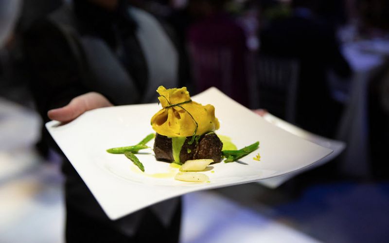 Steak being served.